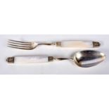 A FRENCH SILVER AND MOTHER OF PEARL FORK AND SPOON. 67 grams. 18cm long. (2)