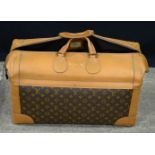 A Louis Vuitton Holdall 32 x 60 x 27 cm