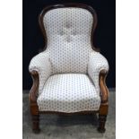 A Victorian upholstered armchair 98 x 69 x 53 cm.