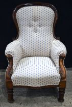 A Victorian upholstered armchair 98 x 69 x 53 cm.