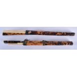 A PAIR OF 19TH CENTURY CHINESE CARVED TORTOISESHELL CHOPSTICK HOLDERS. 27 cm long.