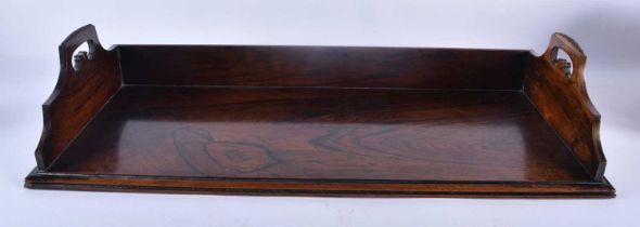 A LOVELY LARGE WILLIAM IV ROSEWOOD LIBRARY BOOK TROUGH of elegant form with ribbed handles. 60 cm