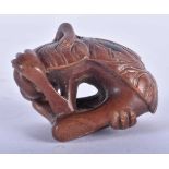 A Japanese Hardwood Netsuke carved as a Monkey. 6.2 cm x 4.5 cm x 3.6 cm, weight 36.6g