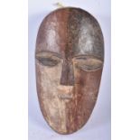 AN AFRICAN TRIBAL CARVED WOOD MASK. 28 cm x 14 cm.