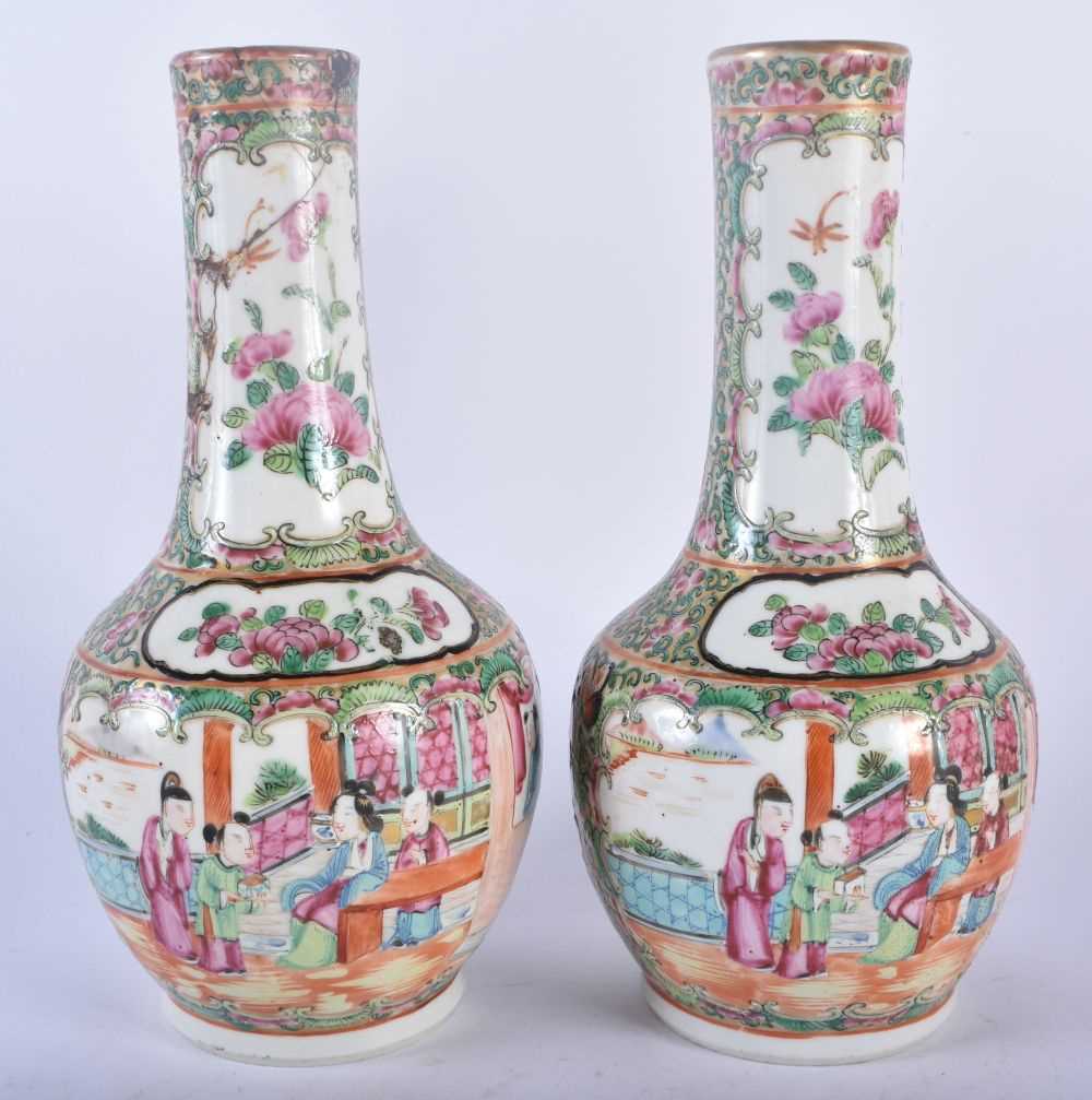 A PAIR OF 19TH CENTURY CHINESE CANTON FAMILLE ROSE VASES Qing. 21 cm high.