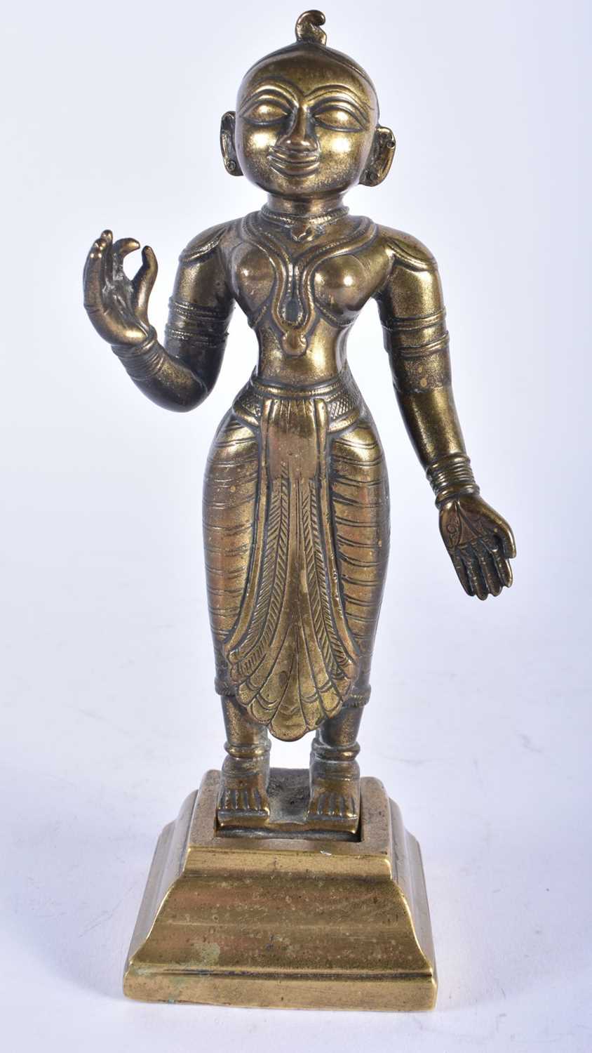 AN 18TH/19TH CENTURY INDIAN BRONZE FIGURE OF A HINDU DEITY. 19 cm high.