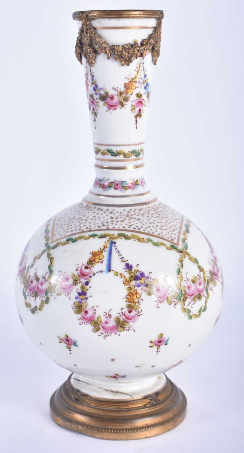 A 19TH CENTURY FRENCH SEVRES PORCELAIN BULBOUS VASE painted with floral swags and baskets of