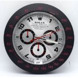 A Contemporary Rolex style dealership clock 33 cm.