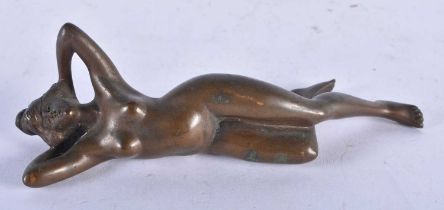 A Bronze Figure of a Reclining Nude. 14cm x 5.3 cm x 4.2 cm, weight 300g