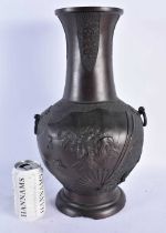 A LARGE 19TH CENTURY JAPANESE MEIJI PERIOD BRONZE VASE decorated with birds and foliage. 42 cm x
