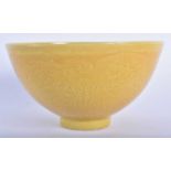 A 19TH CENTURY CHINESE IMPERIAL YELLOW GLAZED PORCELAIN BOWL bearing King marks to base. 15 cm