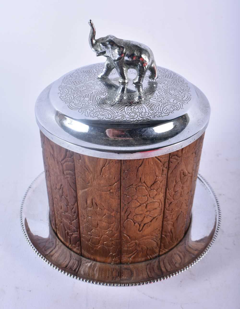 AN ANGLO INDIAN SILVER PLATED CARVED WOOD ELEPHANT BISCUIT BARREL AND COVER together with a bronze - Image 5 of 7
