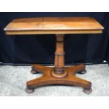 A small Victorian Pedestal reading table with top opening writing slopes 73 x 91 cm.