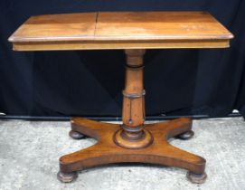 A small Victorian Pedestal reading table with top opening writing slopes 73 x 91 cm.