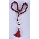 A TURKISH CHERRY AMBER TYPE TESBIH NECKLACE. 93 grams. 94 cm long.