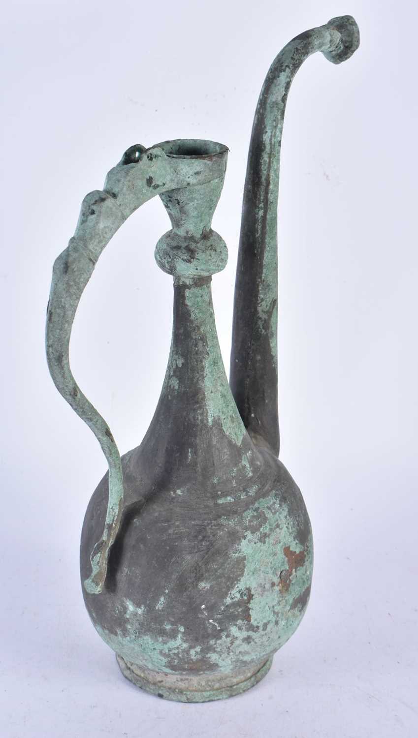 An Early Middle Eastern Copper Ewer. 35cm x 17cm - Image 3 of 3