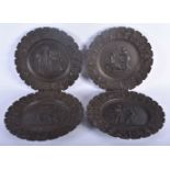 A SET OF FOUR 19TH CENTURY GRAND TOUR CAST IRON CLASSICAL PLAQUES decorated with a border of grape