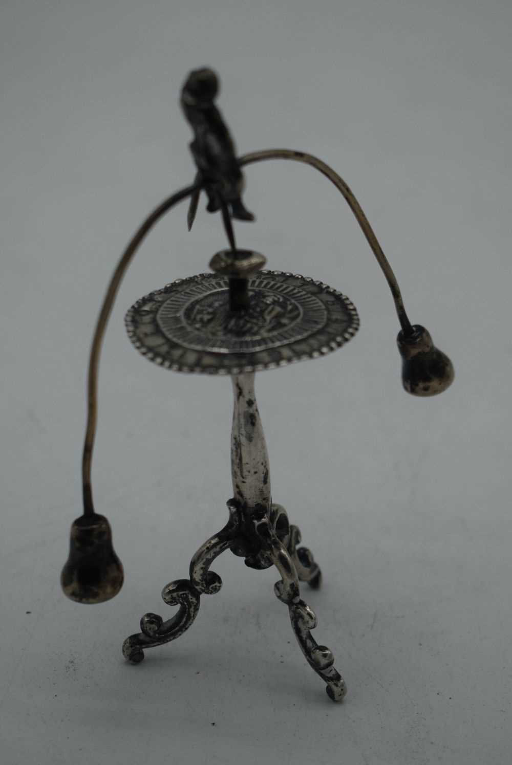 A RARE 18TH CENTURY CONTINENTAL SPINNING MALE TABLE TOY probably Dutch silver. 75 grams. 12 cm x 9.5