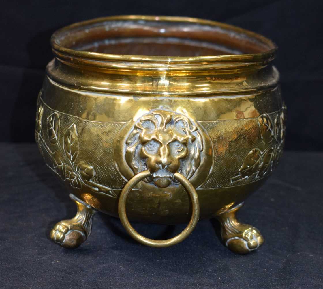 An antique repousse brass planter 19 x 58 cm. - Image 3 of 8