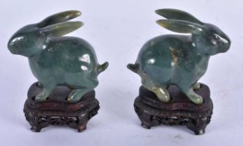 A PAIR OF EARLY 20TH CENTURY CHINESE JADE FIGURES OF RABBITS Late Qing/Republic. 9 cm x 5 cm.