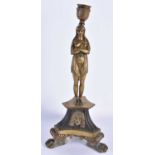 A MID 19TH CENTURY FRENCH BRONZE CANDLESTICK formed as a female. 32 cm high.