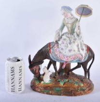 A RARE 19TH CENTURY FRENCH BISQUE PORCELAIN FIGURE OF A FEMALE modelled riding upon a donkey with