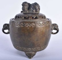 A CHINESE TWIN HANDLED BRONZE CENSER AND COVER 20th Century. 1523 grams. 16 cm x 14 cm.