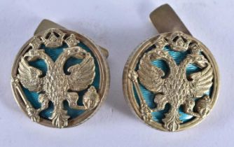 A PAIR OF SILVER AND ENAMEL DOUBLE EAGLE CUFFLINKS. 36 grams. 2.5 cm diameter.