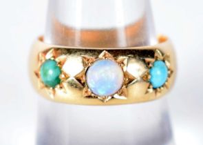 An 18 Carat Gold Ring set with Three Opals. Stamped 18K, Size O, weight 7.5g