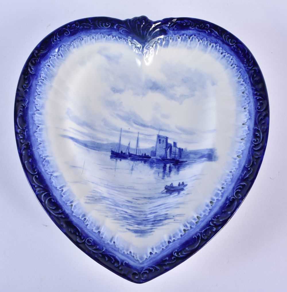 Royal Crown Derby heart shaped dish painted in blue with fishermen at dock, a small boat in the