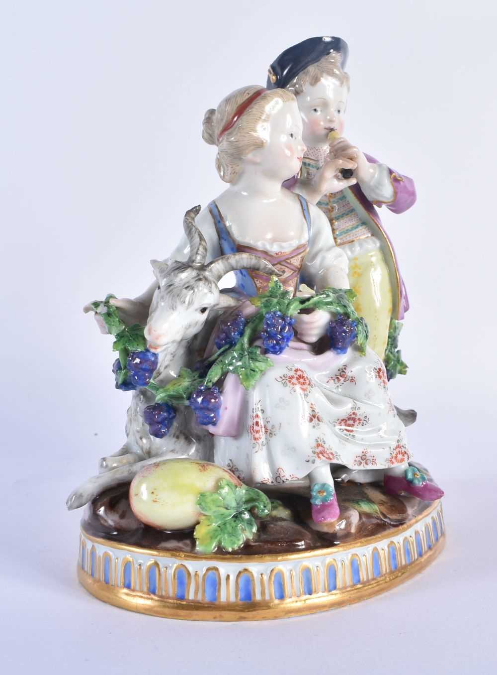 Late 19th century Meissen figural group of two children and a goat, he playing a flute and she - Image 2 of 6