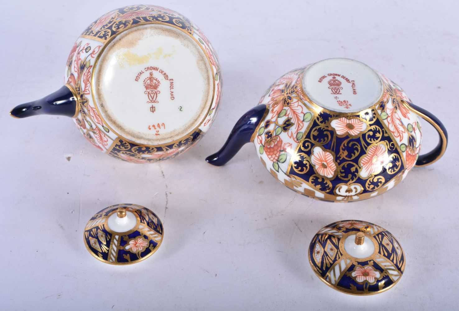 TWO MINIATURE ROYAL CROWN DERBY IMARI TEAPOTS AND COVERS. Largest 7 cm x 8 cm. (2) - Image 3 of 3