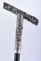 A 19TH CENTURY SOUTH EAST ASIAN SILVER MOUNTED WALKING CANE. 90 cm long.
