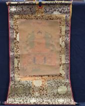 A Tibetan silk Tanka 84 x 57 cm