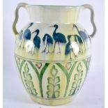 AN UNUSUAL EUROPEAN EARLY 20TH CENTURY TWIN HANDLED PORCELAIN VASE signed A.H, painted with birds