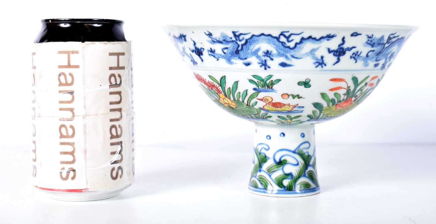 A Chinese porcelain Stem cup with symbols to the interior and Dragons 11 x 17 cm. - Image 2 of 8