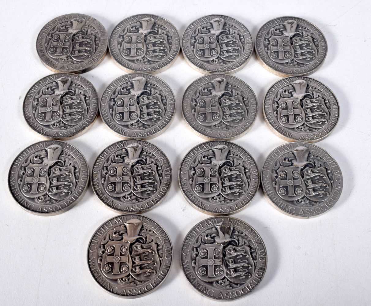 Fourteen Silver Swimming Medals. Stamped Sterling. 3.2 cm diameter, total weight 273.5g (14)