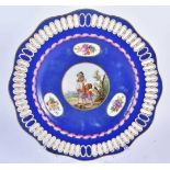AN ANTIQUE MEISSEN PORCELAIN RETICULATED PLATE. 22.5 cm wide.