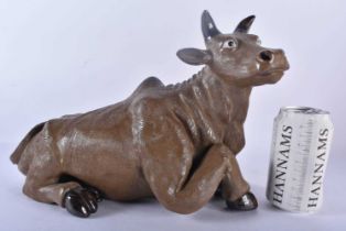 AN UNUSUAL LATE 19TH CENTURY CHINESE CARVED POTTERY FIGURE OF A RECUMBENT BULL Late Qing. 32 cm x 24