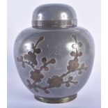 A LATE 19TH CENTURY CHINESE PEWTER TEA CADDY AND COVER decorated with foliage. 16 cm x 11cm.
