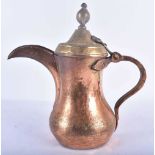 AN ISLAMIC MIDDLE EASTERN TURKISH COPPER ALLOY EWER. 24 cm x 24 cm.