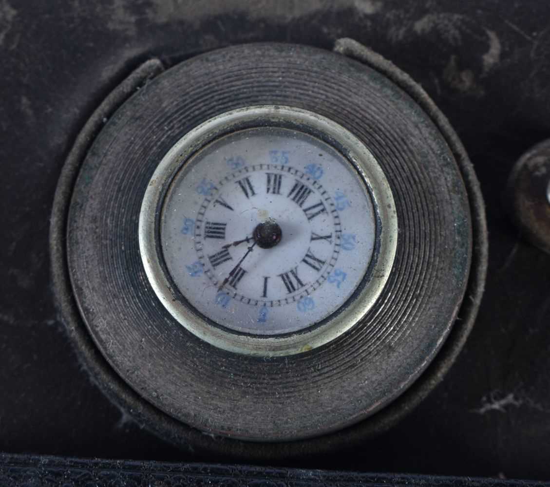 AN ANTIQUE SILVER MOUNTED LEATHER CLOCK WALLET together with Russian boxes, an Indian enamelled vase - Image 3 of 8