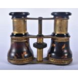 A PAIR OF ANTIQUE TORTOISESHELL OPERA GLASSES. 9 cm x 9 cm.