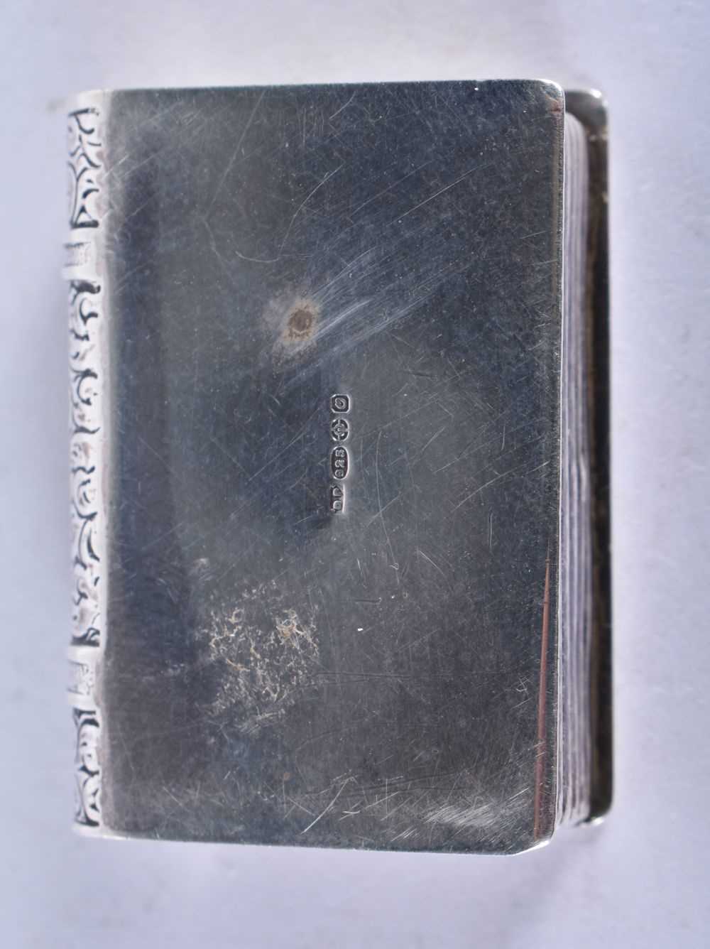 A Silver Pill Box in the form of a Book with Gilt lining. Hallmarked London 1988, 3.5 cm x 2.5 cm - Image 4 of 4