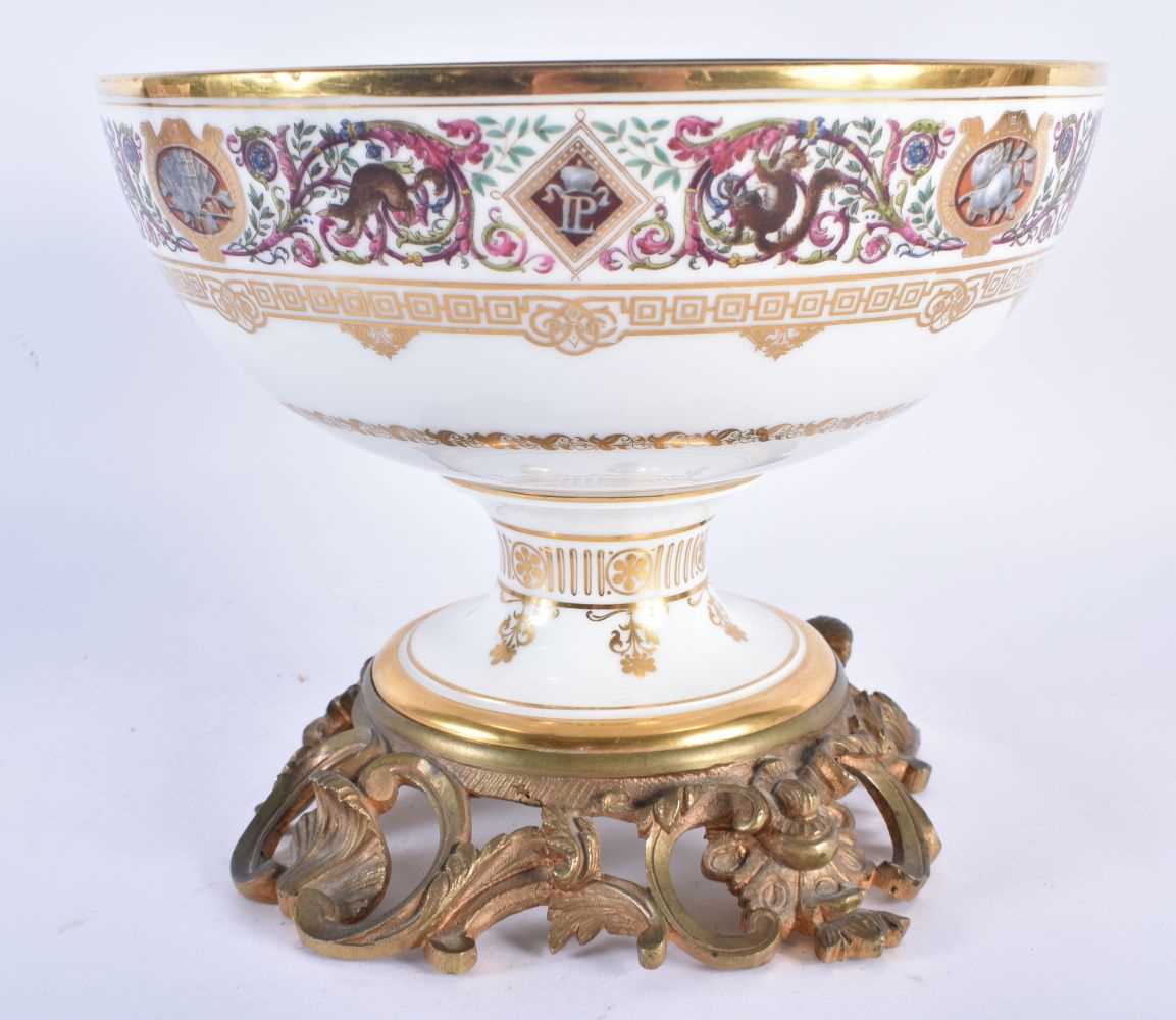 A LATE 19TH CENTURY FRENCH SEVRES PORCELAIN COMPORT painted with foliage and motifs, upon a fitted - Image 2 of 5