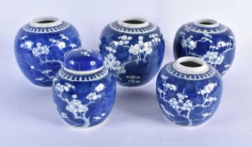 A SET OF FIVE 19TH CENTURY CHINESE BLUE AND WHITE PORCELAIN GINGER JARS Qing. Largest 13 cm x 10 cm.