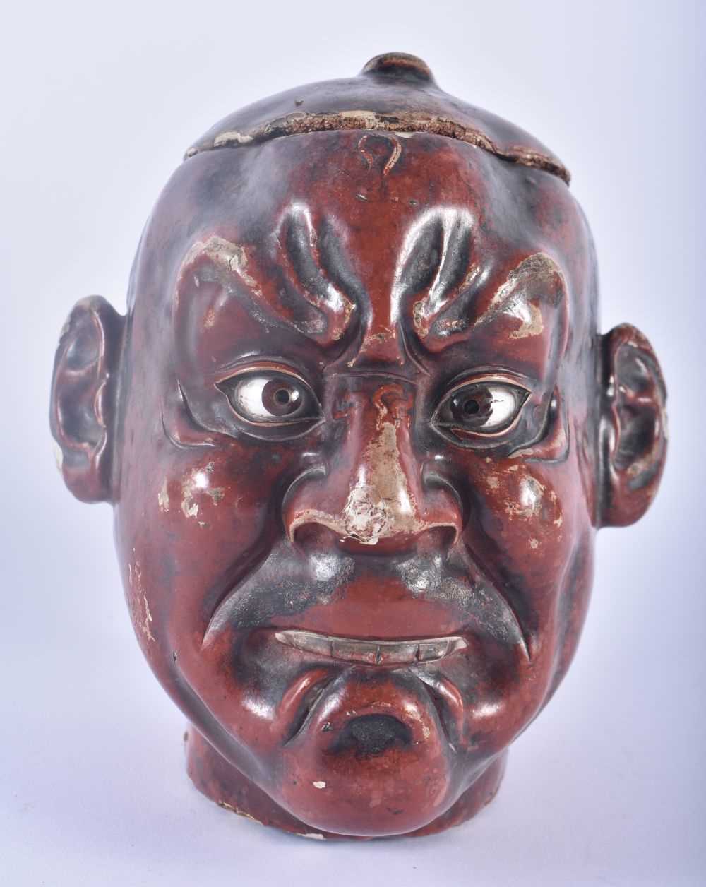 A RARE 19TH CENTURY JAPANESE MEIJI PERIOD TEA CADDY AND COVER formed as a lacquered males head. 16