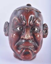 A RARE 19TH CENTURY JAPANESE MEIJI PERIOD TEA CADDY AND COVER formed as a lacquered males head. 16