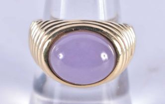 A 14 Carat Gold Ring set with a Lavender Jade Cabochon. Size O, Stamped 14K, weight 5.6g