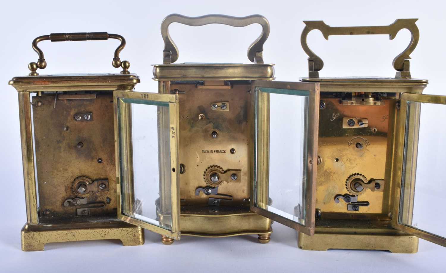 THREE ANTIQUE FRENCH BRASS CARRIAGE CLOCKS 14.25cm high inc handle. (3) - Image 3 of 6